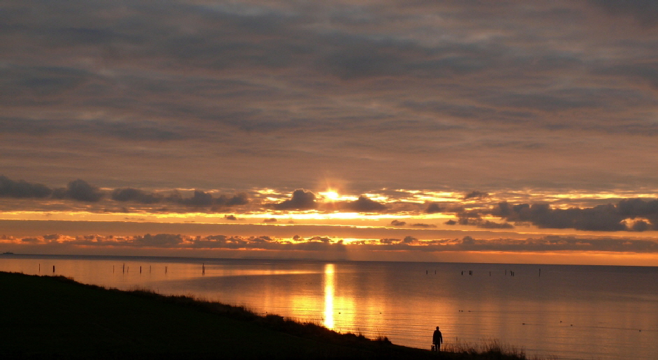 Wolken_und_Sonne_am_Sudstrand